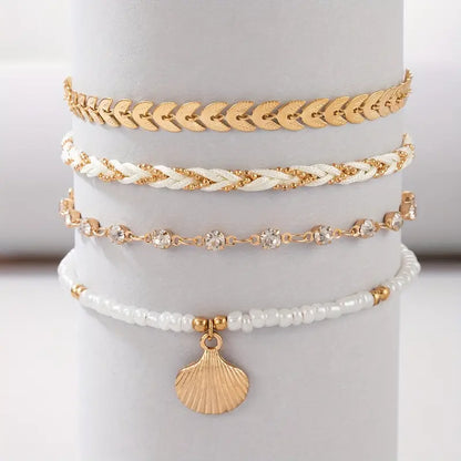 4-delade Puka Snäckskal Armband | Tillsammans mot Bröstcancer